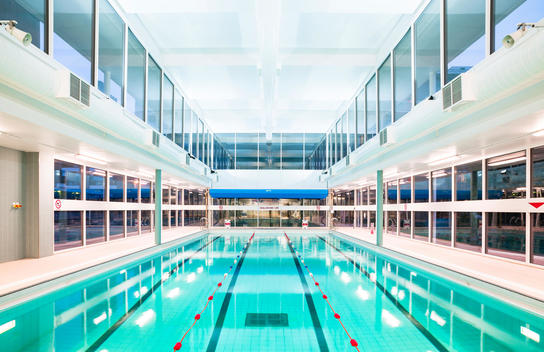 Swimming pool, Golden Lane Leisure Centre design renovation by Cartwright Pickard Architects, original design by Chamberlin Powell and Bon in 1952, Barbican, London, UK.