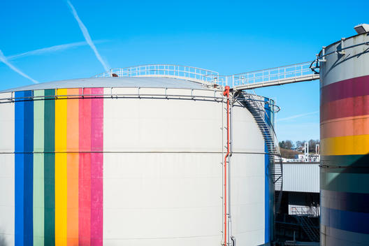Colorful petrochemical storage tanks used for storing liquid gasses, La Souterraine, La Creuse Department, Limousin, France