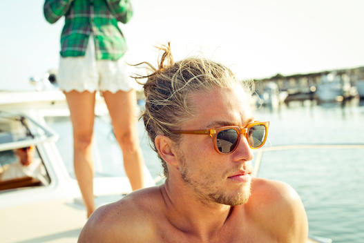 Blonde man bun and sunglasses