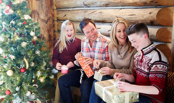 Family opening gifts on Christmas