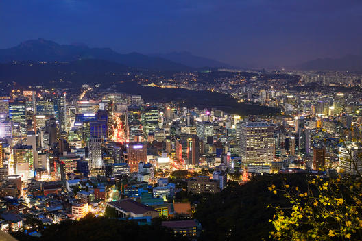 Elevated view of the North of the centre of Seoul with business district of Dongdaemun-Gu illuminated at night from North Seoul Tower