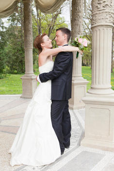 Newlywed Couple Hugging Outdoors
