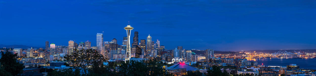 USA, Washington State, skyline of Seattle with Space Needle and Puget Sound at blue hour