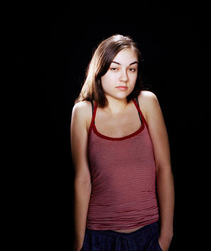 Porn star Sasha Grey stands with her hands in her pajama pants pockets