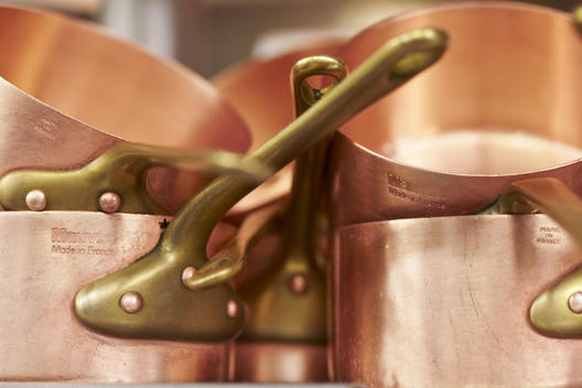 Copper Cooking Pots Sitting On Kitchen Shelf.