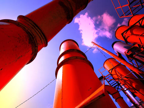 Outdoor View Of Industrial Pipes And Hoppers In Red With Blue Sky