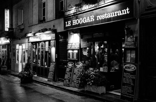 Black and white photograph of Paris storefront