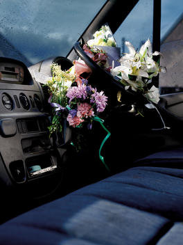 Fresh Flowers In Car\'S Steering Wheel