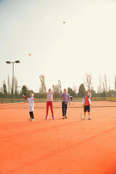 Children Practicing Tennis