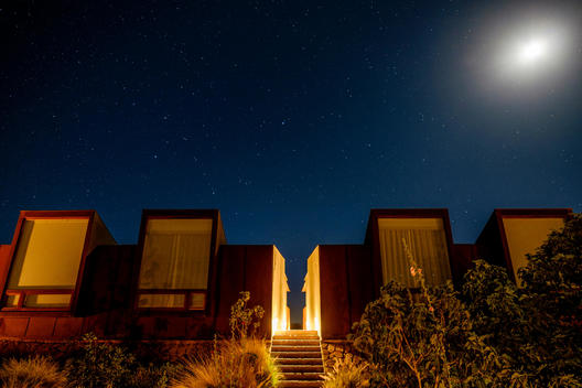 The moon and stars shine above Tierra Atacama resort in the Atacama Desert in Northern Chile.
