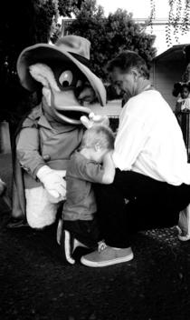 Man With Grand Son And Donald Duck