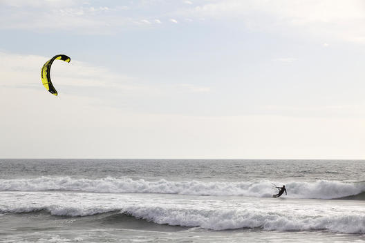 Man Kite Surfing On California Coast