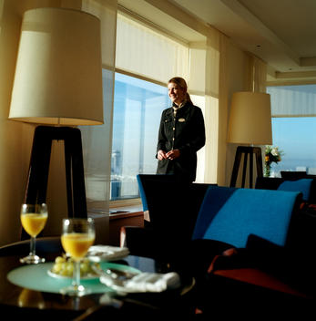 A hotel employee stands in the executive lounge of the hotel at the North Terminal of Gatwick Airport.