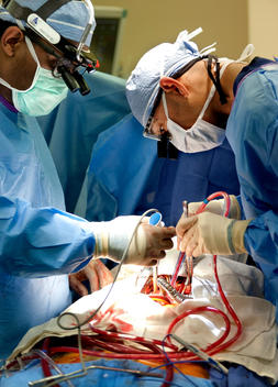 Two surgeons operating in hospital