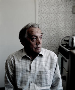 Portrait Of Senior Man In His Kitchen