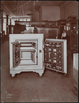 An Open Safe In A Warehouse Or Showroom With Other Safes.