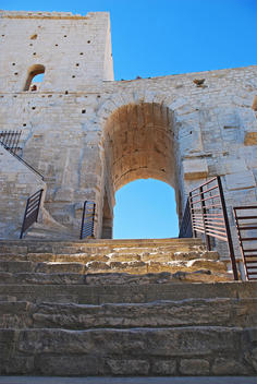 France, Arles, low view of Roman amphitheatre steps. Historical monument, listed as World Heritage by UNESCO.
