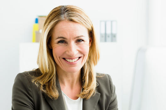 Germany, Portrait of businesswoman, smiling