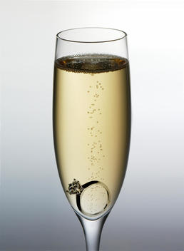 Engagement Ring in a glass of champagne