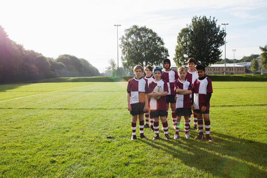 Group portrait of teenage schoolboy rugby team