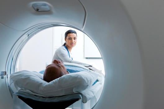 Nurse tends to MRI Patient