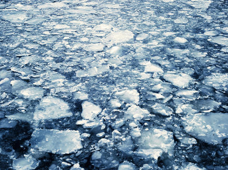 Ice floating on the surface of a river, Berlin, Germany.
