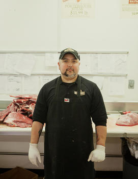 Butcher portrait at meat market