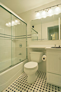 Small White And Black Tiled Bathroom