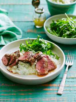 Plate of lamb with cauliflower, pear and mint mash