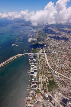 Aerial view of ocean and urban coastline