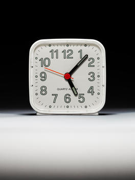 Vintage Alarm Clock On Black And White