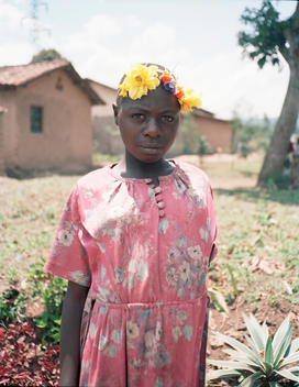 Woman with flower garland, Gisenyi, Rwanda, 2007.