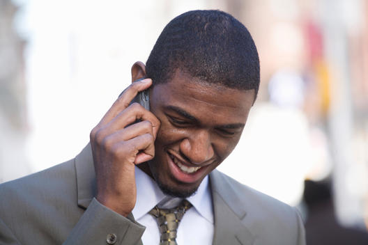 Man In Suit On Cell Phone