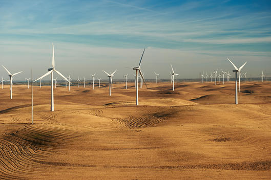 Low-level aerial photograph of wind turbines/wind farm in Solano County, California.