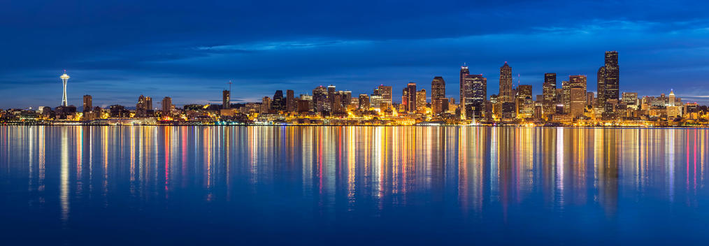 USA, Washington State, Puget Sound and skyline of Seattle with Space Needle at blue hour