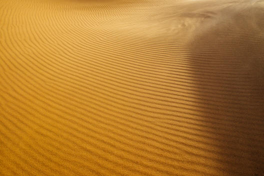 The effect of wind on the sand dunes of the desert in Namibia