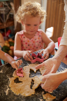 Mother and children making cookies