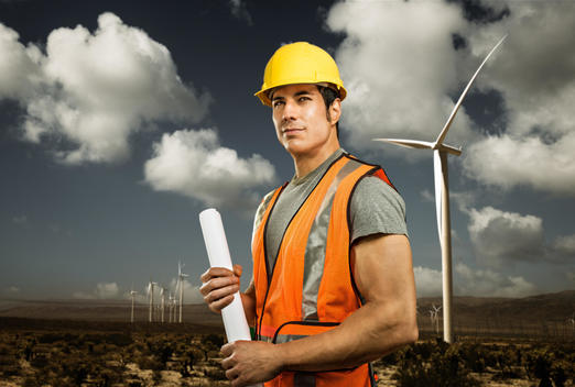 Man standing in front of wind farm