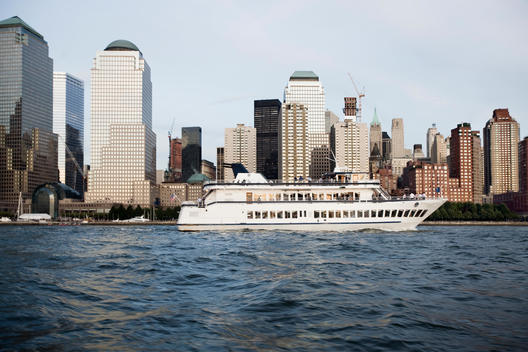 Ferry Passing The Skyline Of Manhattan, New York City, New York, Usa.