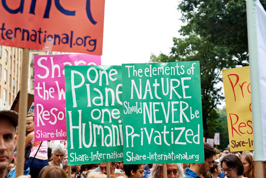 banners pro organic and environment at the climate march