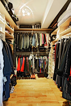Closet Packed With Clothes