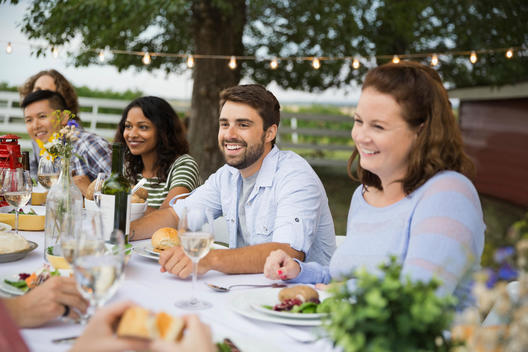 Friends gathered at outdoor dinner party