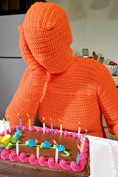 Yarn man sad at his birthday party