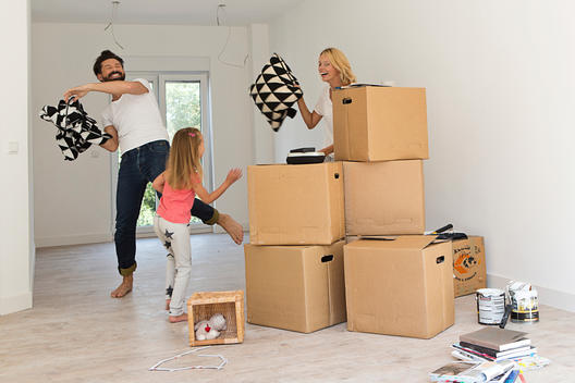 family moves in a new house