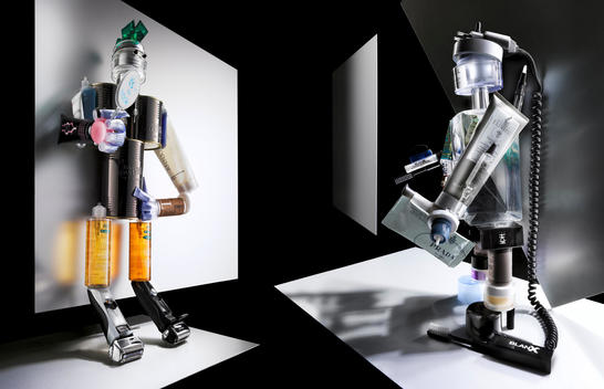 Diptych Of Robot Sculptures Made Out Of Cosmetics