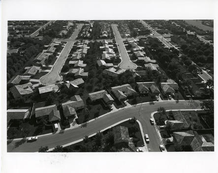 An aerial view of a common minimal suburban neighborhood