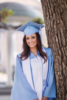 UNC female college graduate in cap and gown