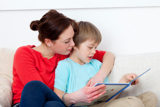 Mother And Son Reading Together