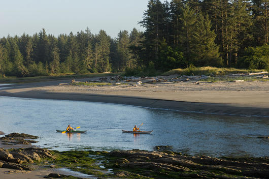 Two men kayaking on Sooes River, Makah Bay, Washington, USA