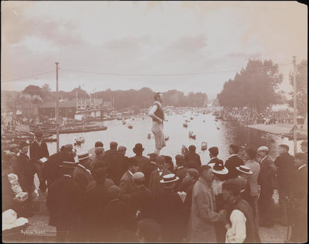 Boats On Thames River And Onlookers From Bridge, A Single Man Standing Above The Crowd.